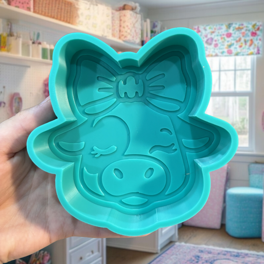 Cow with bow