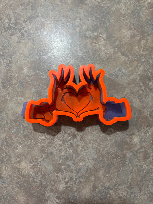 Green man heart hands
