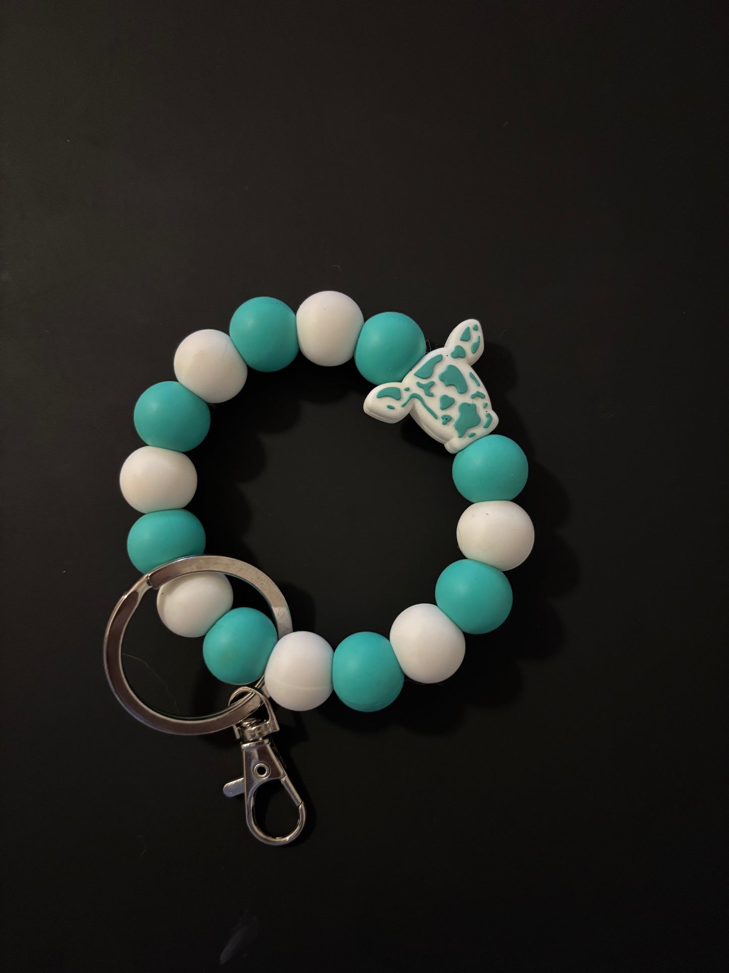 Turquoise cow wristlet