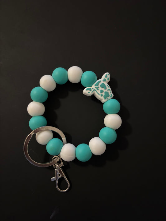 Turquoise cow wristlet
