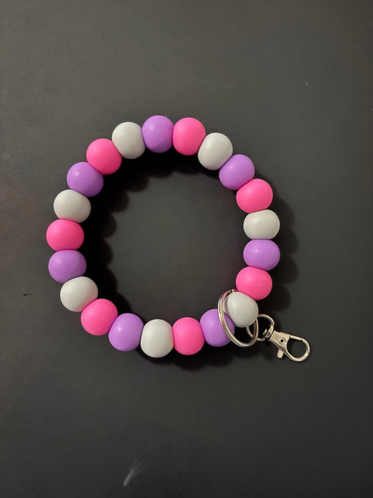 Pink, purple and gray wristlet