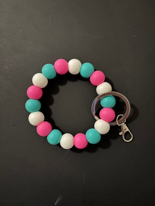 Pink, turquoise and white wristlet