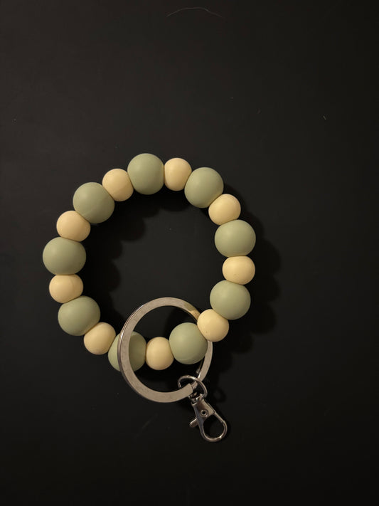 Sage green and cream wristlet