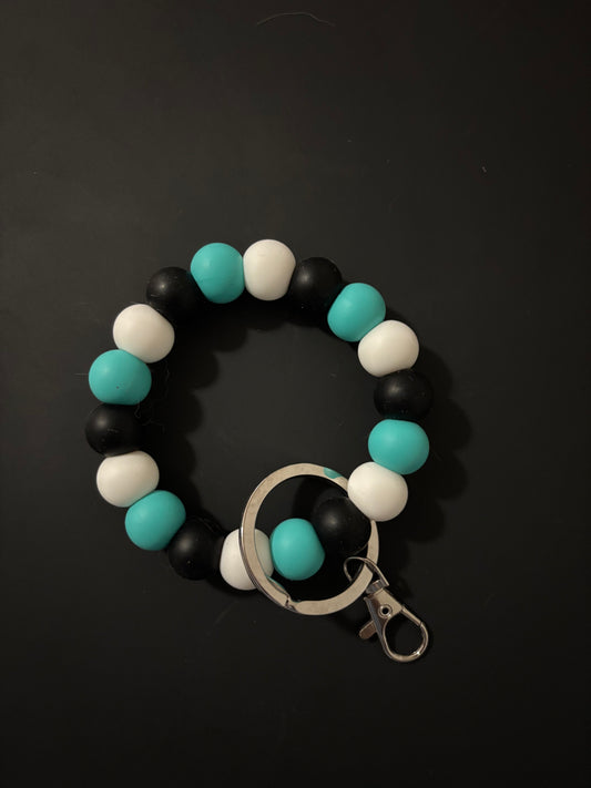 Turquoise, black,and white wristlet